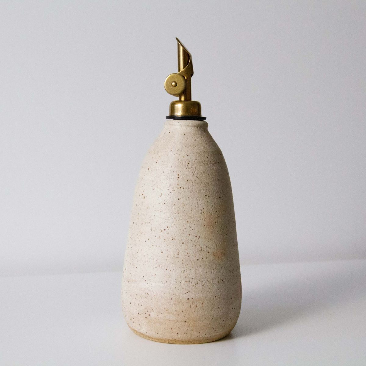 Oil cruet in speckled alabaster
