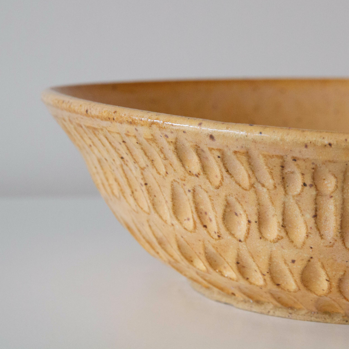 Carved golden sand bowl